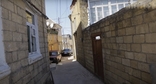 Улица в старой части Дербента. Кадр видео "Магалы Дербента", Валерий Киченко / YouTube.